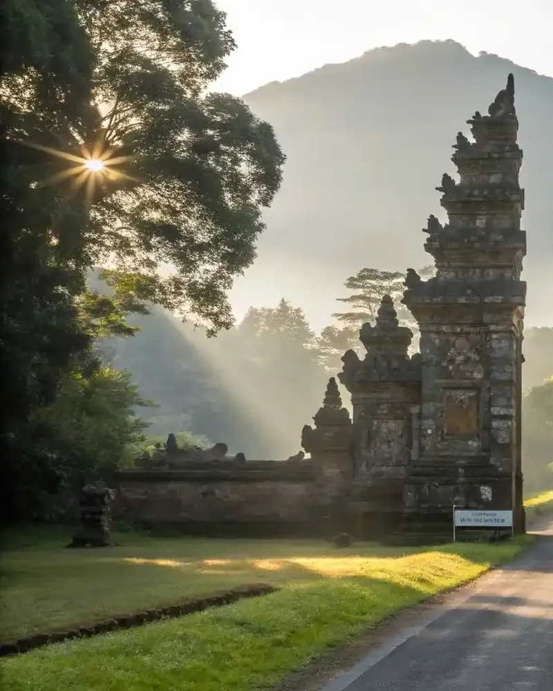 A split temple gate and a road in morning mist