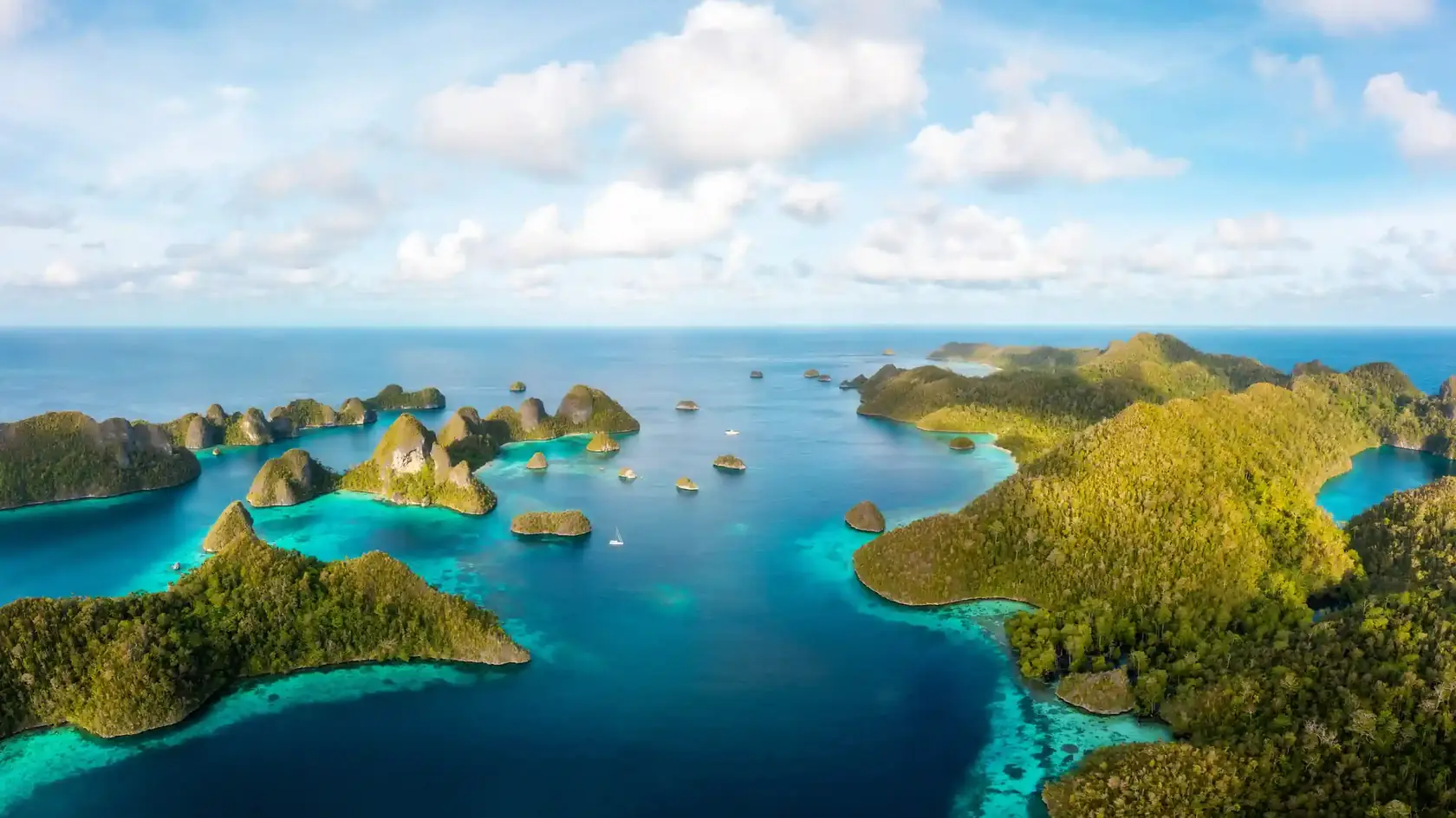 Aerial view of green islands and turquoise lagoons